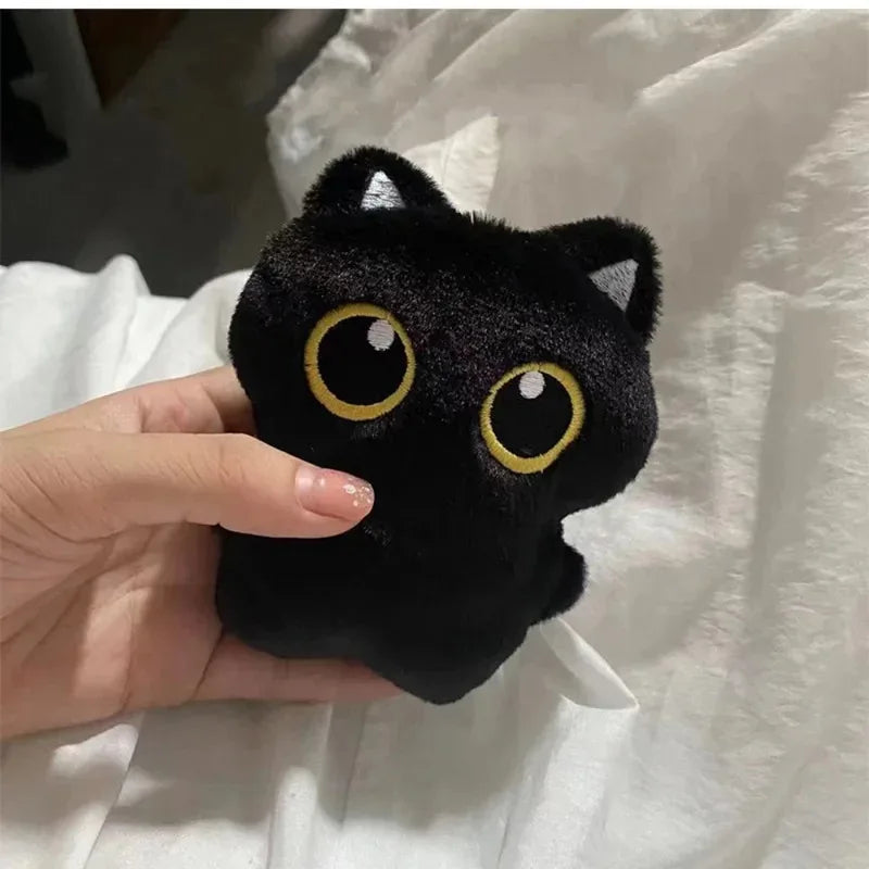 Cute plush toy of a black cat, suitable for decoration and also a great gift option.