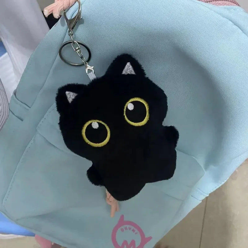 Cute plush toy of a black cat, suitable for decoration and also a great gift option.