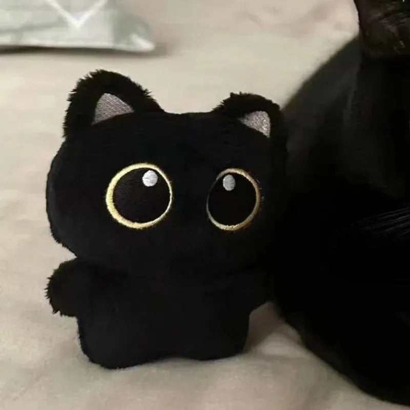 Cute plush toy of a black cat, suitable for decoration and also a great gift option.